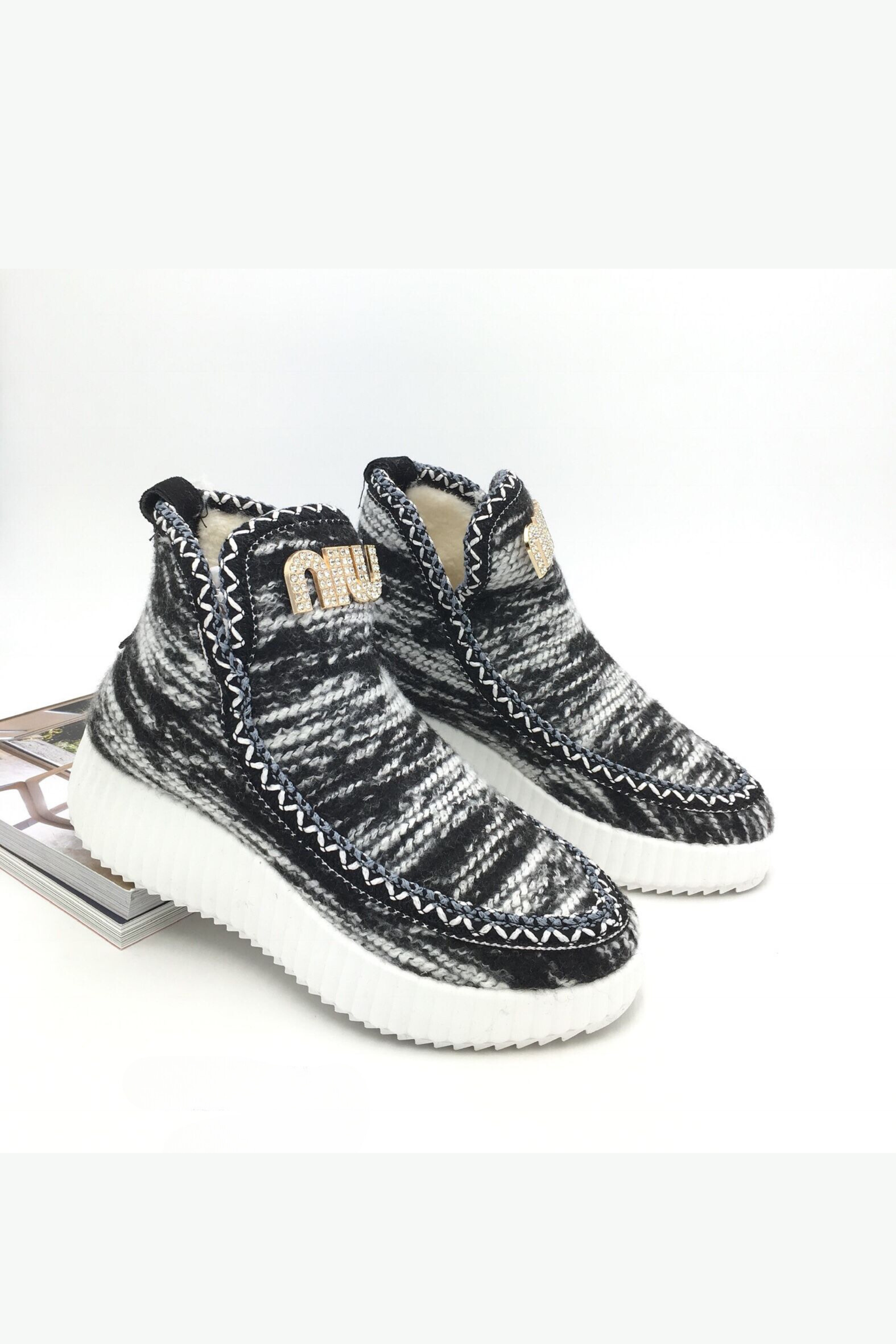 Black Fury Woven Boots